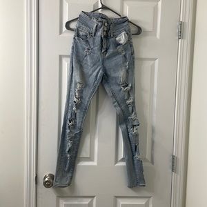 Light wash ripped high waisted skinny jeans